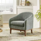 Poltrona Bouclé con Gambe in Legno Massello