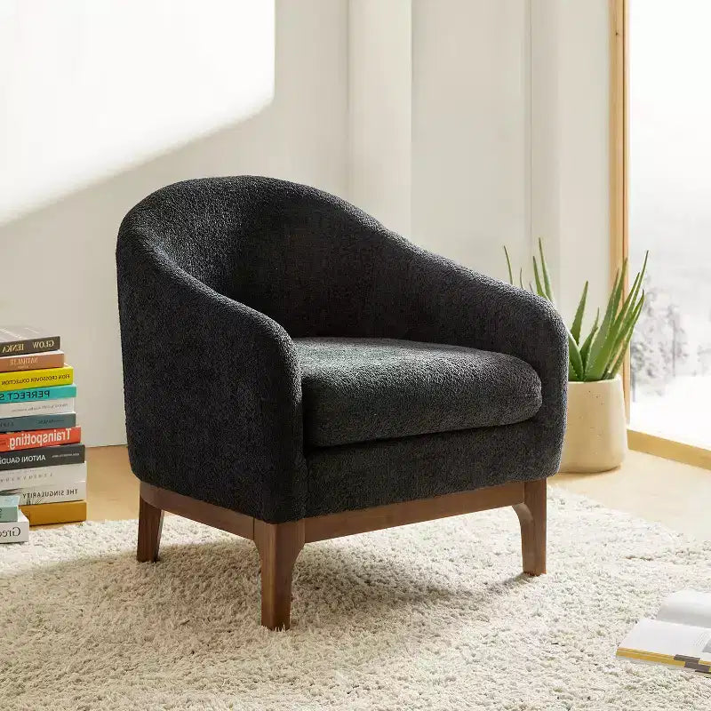 Poltrona Bouclé con Gambe in Legno Massello